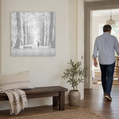 Dot-painting canvas “Autumn Forest”, on a light wall with a person walking through the doorway nearby.