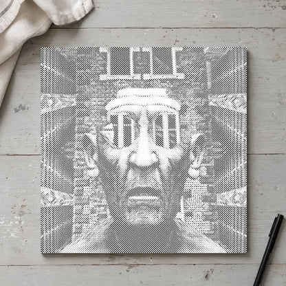 Dot-painting canvas “Fearsome Man”, seen from above on a worktable in soft daylight.