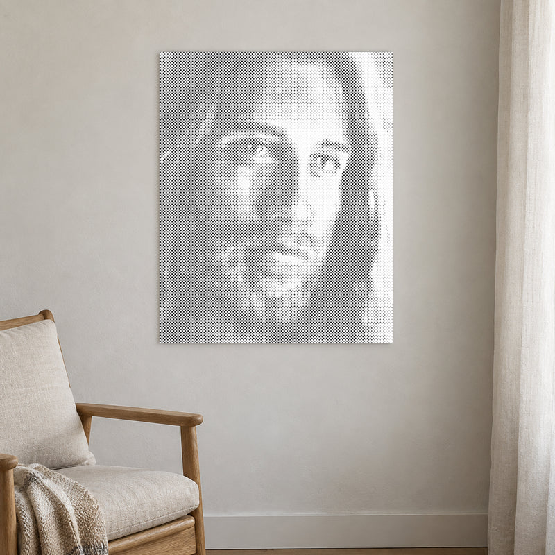 Dot-painting canvas “Jesus Christ”, displayed on a light wall in a softly lit room.