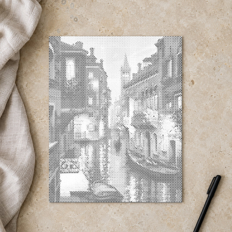Dot-painting canvas “Venice at Night”, seen from above on a worktable in soft daylight.